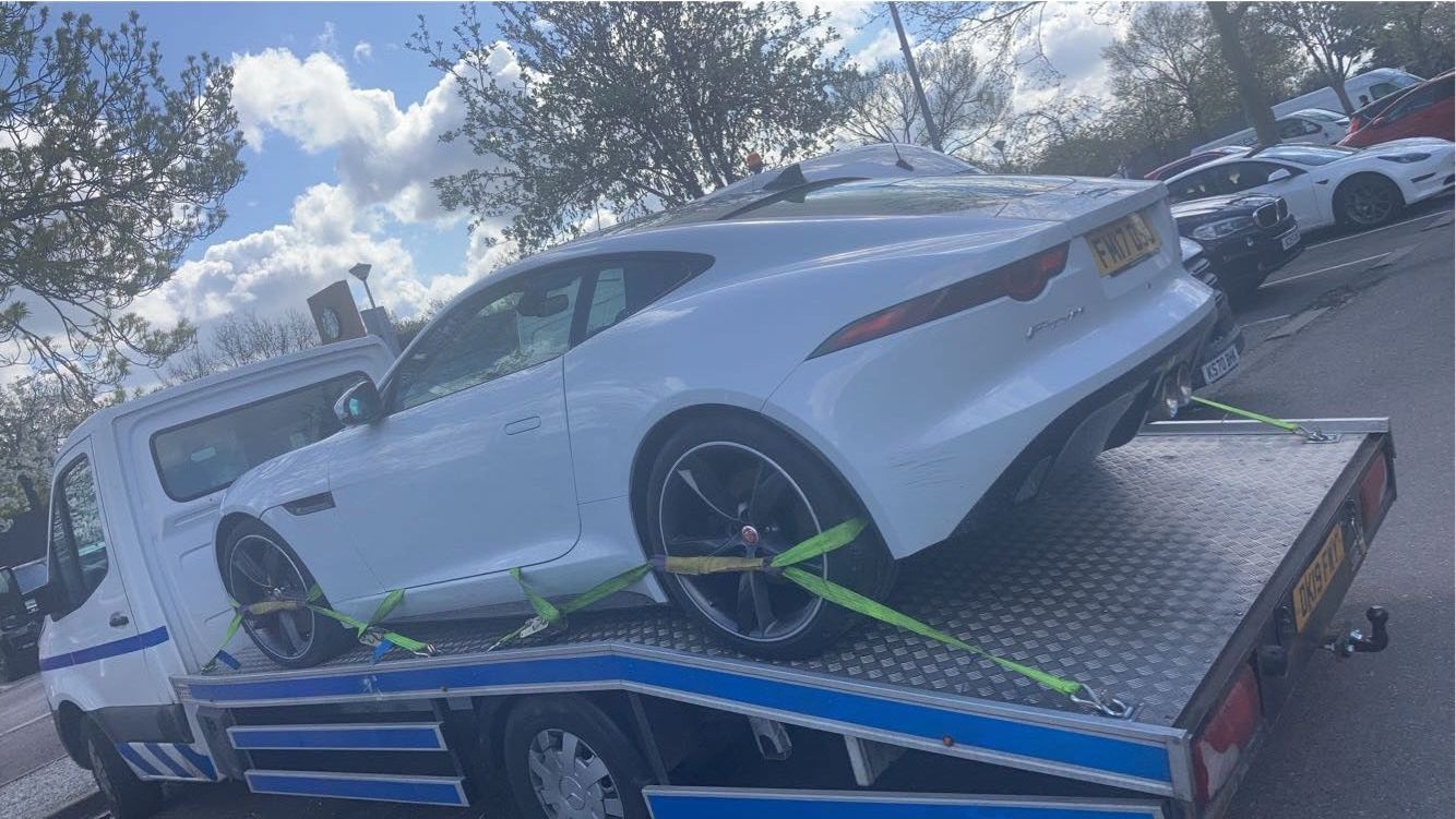 Car secured on a professional recovery truck