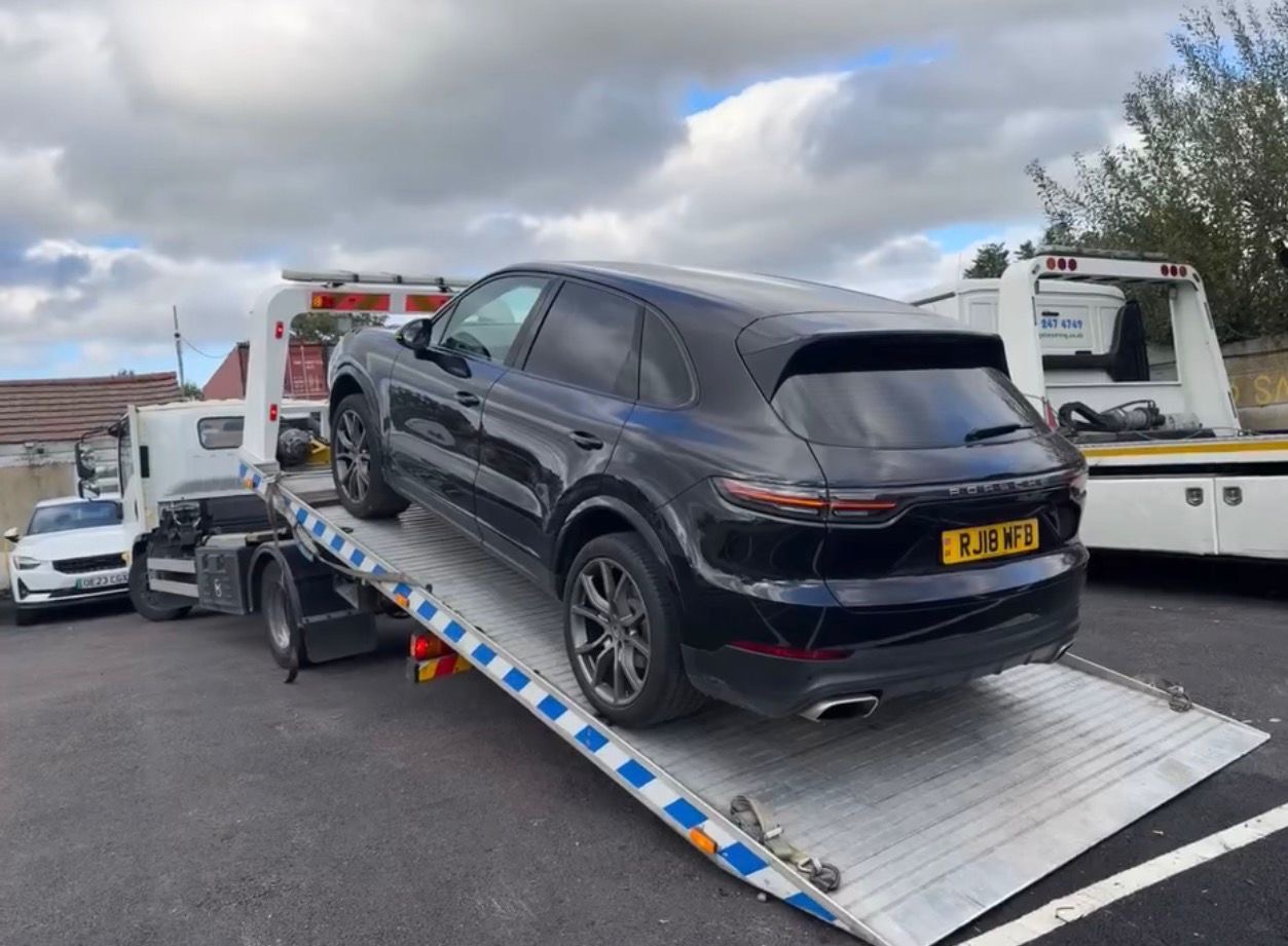 Prestige car transported on recovery truck